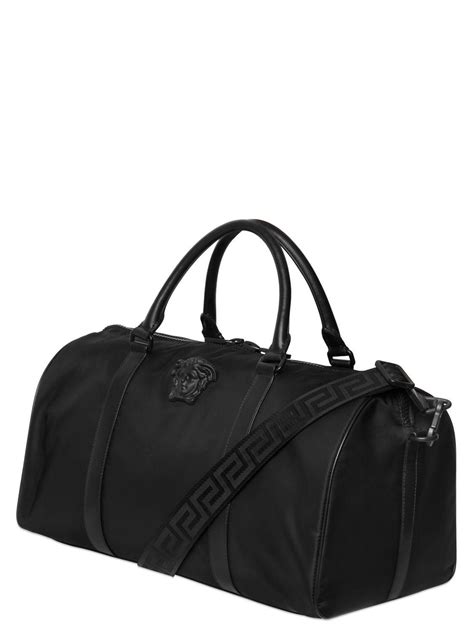 versace leather duffle bag.